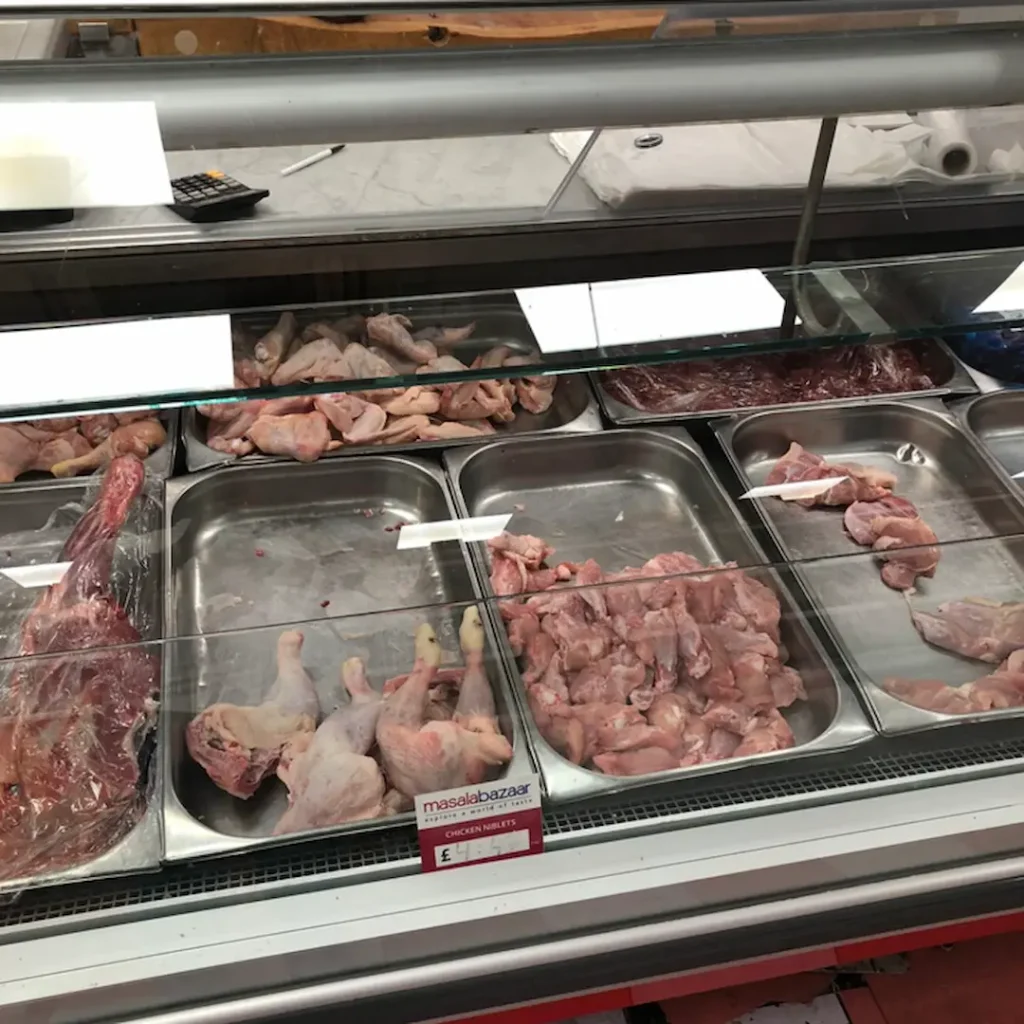 Butchers Counter With Chicken And Pork